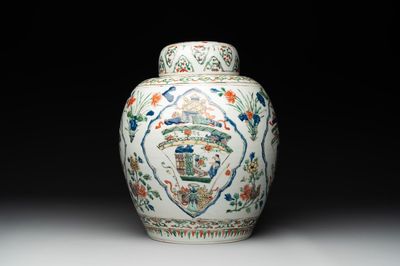 A Chinese famille verte 'figures and antiquities' jar and cover, Kangxi