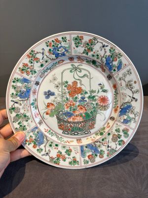 A Chinese famille verte 'flower basket' dish, ding mark, Kangxi — photo 1