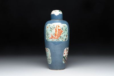 A Chinese famille verte powder-blue-ground 'Fish and Bird' vase and cover, 19th C.
