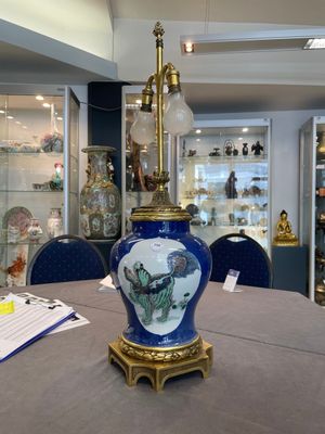 A Chinese famille verte  powder-blue-ground 'mythical animal' vase with gilt bronze lamp mounts, 19th C. — photo 3