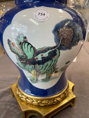 A Chinese famille verte  powder-blue-ground 'mythical animal' vase with gilt bronze lamp mounts, 19th C. — photo 9