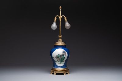 A Chinese famille verte powder-blue-ground 'mythical animal' vase with gilt bronze lamp mounts, 19th C.