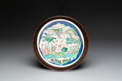 A Chinese famille verte powder-blue-ground 'qilin and phoenix' dish mounted as guéridon, Kangxi and later