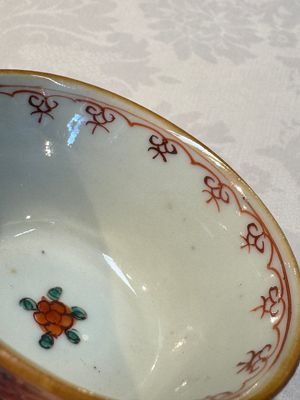 A Chinese famille verte teapot and three famille rose capucine-ground cups and saucers, Kangxi/Qianlong — photo 46