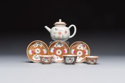A Chinese famille verte teapot and three famille rose capucine-ground cups and saucers, Kangxi/Qianlong