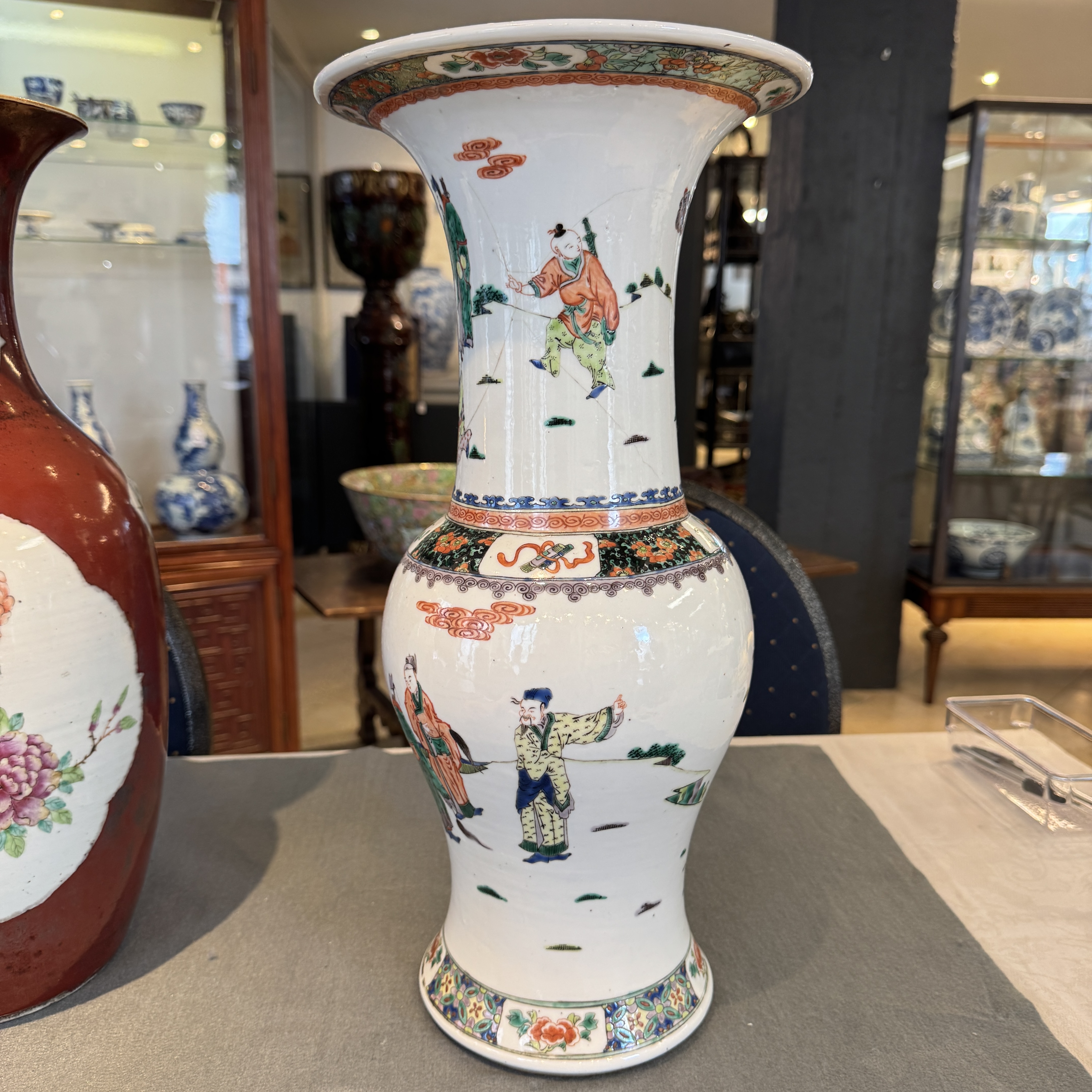 A Chinese famille verte 'Yenyen' vase and a famille rose red-ground vase — photo 12