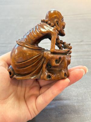 A Chinese fine huanghuali sculpture of a Luohan on a zitan stand, Qianlong mark, 19/20th C. — photo 8