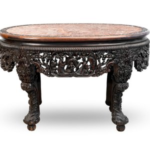 A Chinese finely carved hongmu marble top oval table, Canton, 19th C. — photo 1