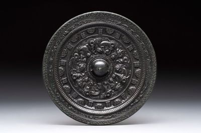 A Chinese finely cast 'immortals' bronze mirror, Wu Zuo Ming Jing 吾作明鏡 mark, Eastern Han