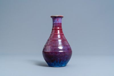 A Chinese flambé-glazed bottle vase, Yongzheng mark, 19th C.