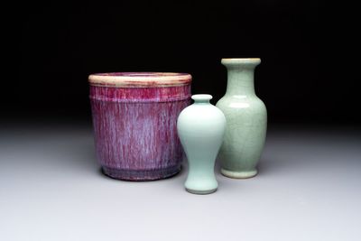 A Chinese flambé-glazed cylindrical jardinière and two celadon-glazed vases, 19th C.