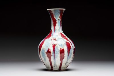 A Chinese flambé-glazed ge-type-ground bottle vase, 19th C.