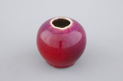 A Chinese flambe-glazed porcelain ink jar, 19th C.