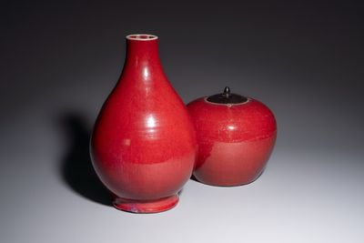 A Chinese flambé-glazed vase and a jar with wooden cover, 19th C.