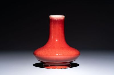 A Chinese flambé-glazed vase of compressed form, 19th C.