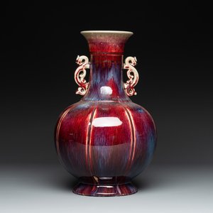 A Chinese flambé-glazed vase with archaistic dragon handles, 19th C. — photo 1