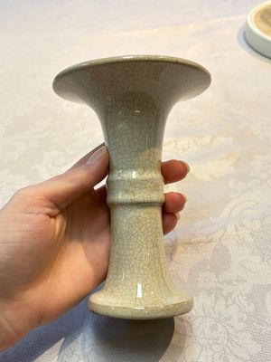 A Chinese Ge-ware archaistic 'Gu' vase, a white-glazed anhua-decorated ink stone and a yellow-ground bowl, 20th C. — photo 16