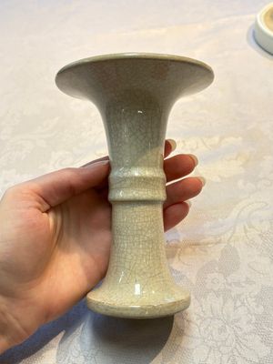 A Chinese Ge-ware archaistic 'Gu' vase, a white-glazed anhua-decorated ink stone and a yellow-ground bowl, 20th C. — photo 17