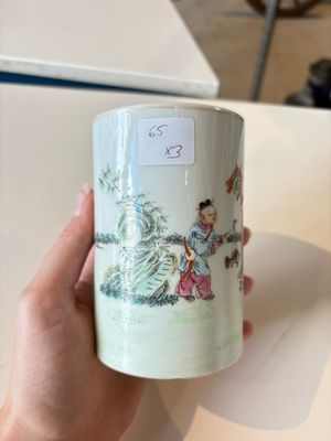 A Chinese gilt- and iron-red-decorated white-glazed Milefo Buddha, a famille rose vase and a brush pot, Qianlong and Xue Changseng 薛長森 mark, 20th C. — photo 1