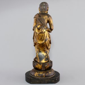 A Chinese gilt and laquered wood figure of a female deity, 18/19th C. — photo 3