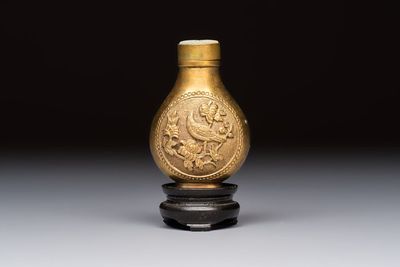 A Chinese gilt-bronze and mother-of-pearl-inlaid snuff bottle with birds among flowering branches, Guangxu mark and of the period