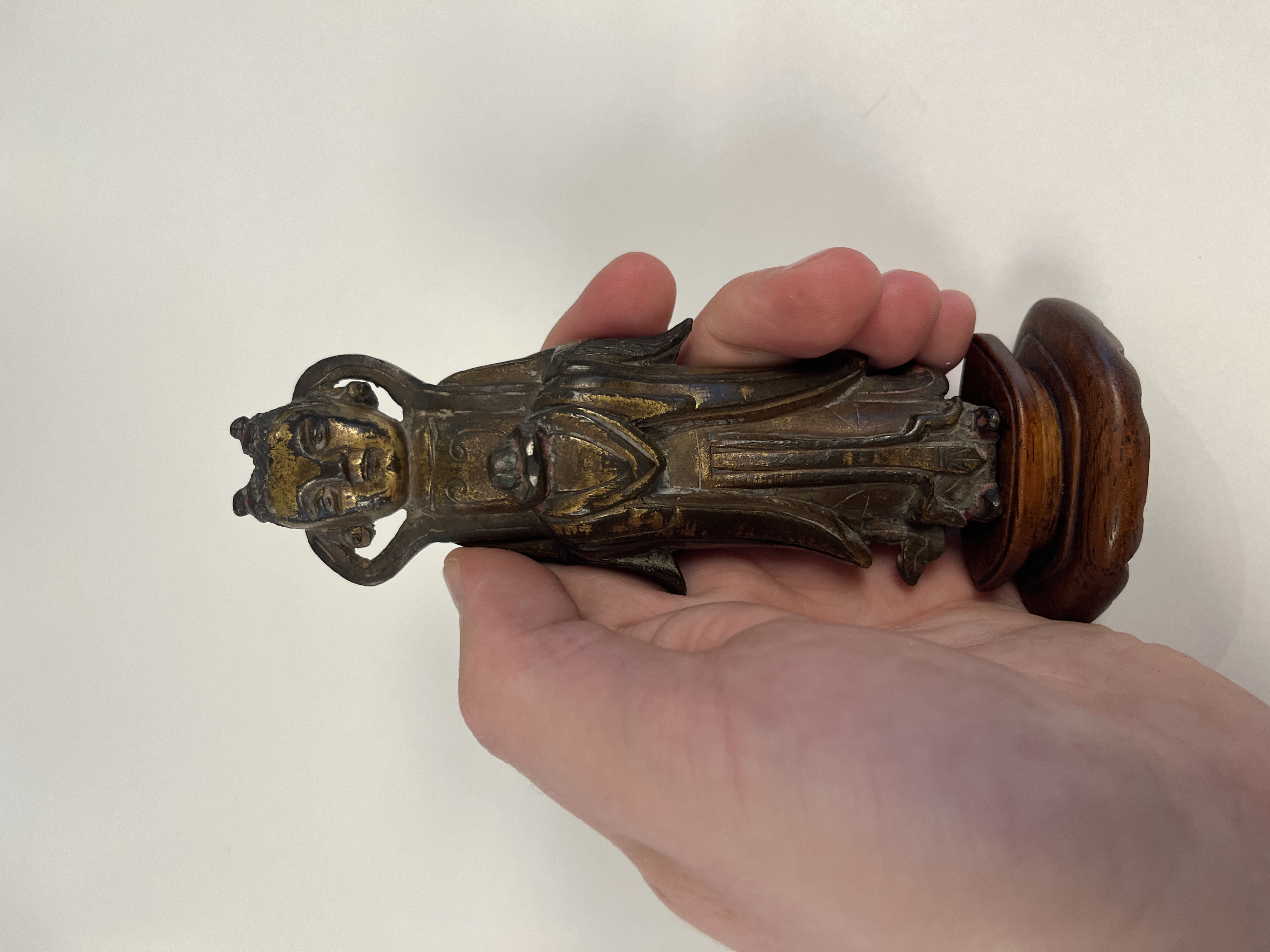 A Chinese gilt-bronze figure of Longnu on a wooden stand — photo 1