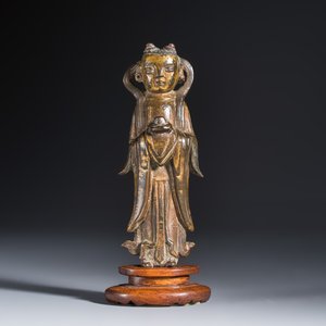 A Chinese gilt-bronze figure of Longnu on a wooden stand — photo 2