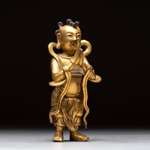 A Chinese gilt-bronze figure of Sudhana, 16/17th C. — 照片 1
