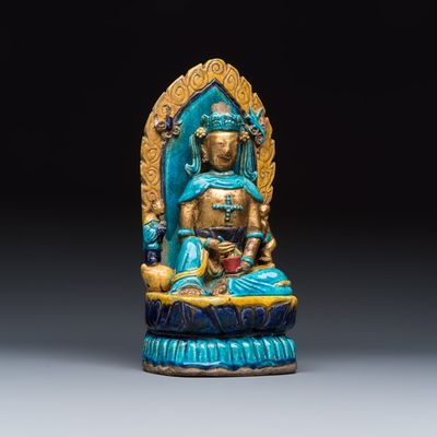 A Chinese gilt-decorated Fahua-glazed stoneware 'Bodhisattva with Attendants' group, Ming