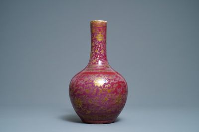 A Chinese gilt-decorated flambé-glazed bottle vase, 19th C.