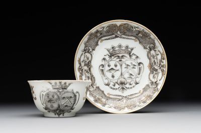 A Chinese gilt-decorated grisaille armorial cup and saucer, Qianlong