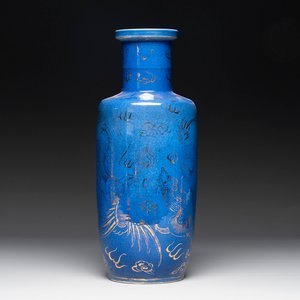 A Chinese gilt-decorated powder-blue 'dragon and phoenix' rouleau vase, 19th C. — photo 1