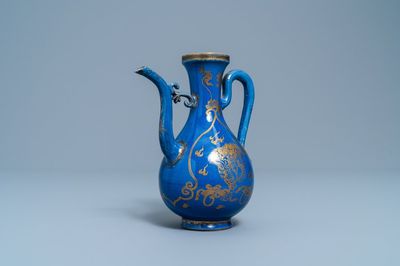 A Chinese gilt-decorated powder blue-ground jug with mythical beasts, Kangxi