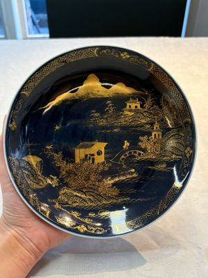 A Chinese gilt-decorated powder-blue plate and a famille verte plate with flowers, Kangxi/Qianlong — photo 1