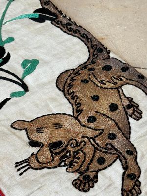 A Chinese gilt-metal embroidered silk 'animals' children's robe, 19/20th C. — photo 4