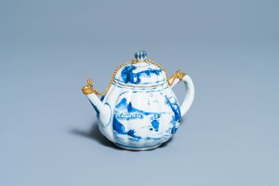 A Chinese gilt-mounted blue and white teapot and cover, Kangxi