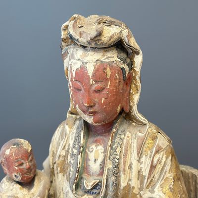 A Chinese gilt-polychromed carved wooden group of Guanyin and child — photo 5