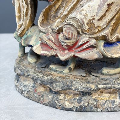 A Chinese gilt-polychromed carved wooden group of Guanyin and child — photo 10