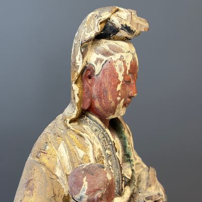 A Chinese gilt-polychromed carved wooden group of Guanyin and child — photo 14