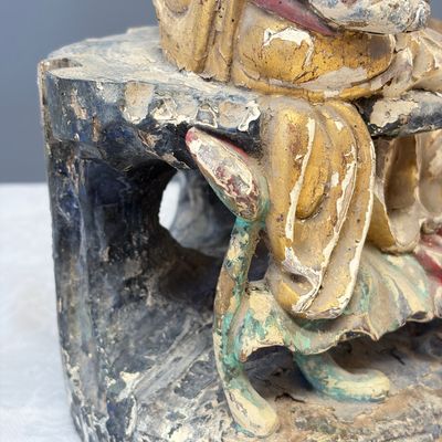 A Chinese gilt-polychromed carved wooden group of Guanyin and child — photo 16
