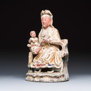 A Chinese gilt-polychromed carved wooden group of Guanyin and child — photo 1