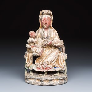 A Chinese gilt-polychromed carved wooden group of Guanyin and child — photo 2