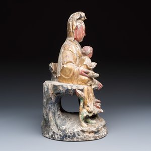 A Chinese gilt-polychromed carved wooden group of Guanyin and child — photo 5