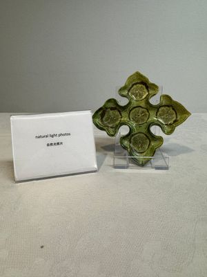 A Chinese green-glazed marbled dish, probably Tang — photo 1