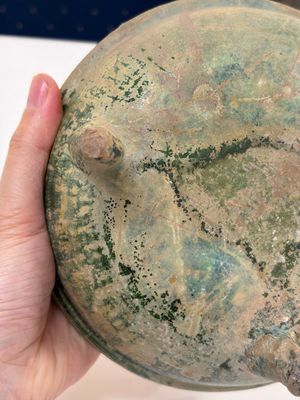 A Chinese green-glazed pottery ritual tripod food vessel with handles, 'Ding 鼎', Han — photo 13