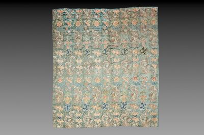 A Chinese green-ground embroidered silk panel with dragons among clouds, 18th C.