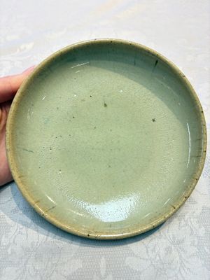 A Chinese green 'Jun' plate, Tian Hu Shan 天湖山 mark, Yuan — photo 1