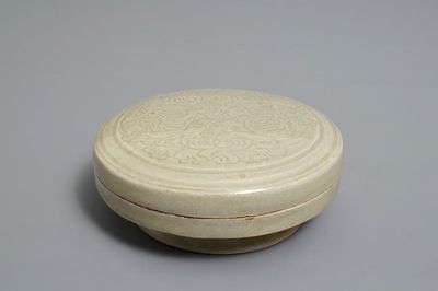 A Chinese grey-glazed round box and cover with underglaze design, Northern Song or later
