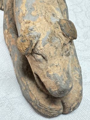 A Chinese grey pottery model of a reclining dog, Han — photo 7