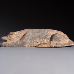 A Chinese grey pottery model of a reclining dog, Han — photo 2